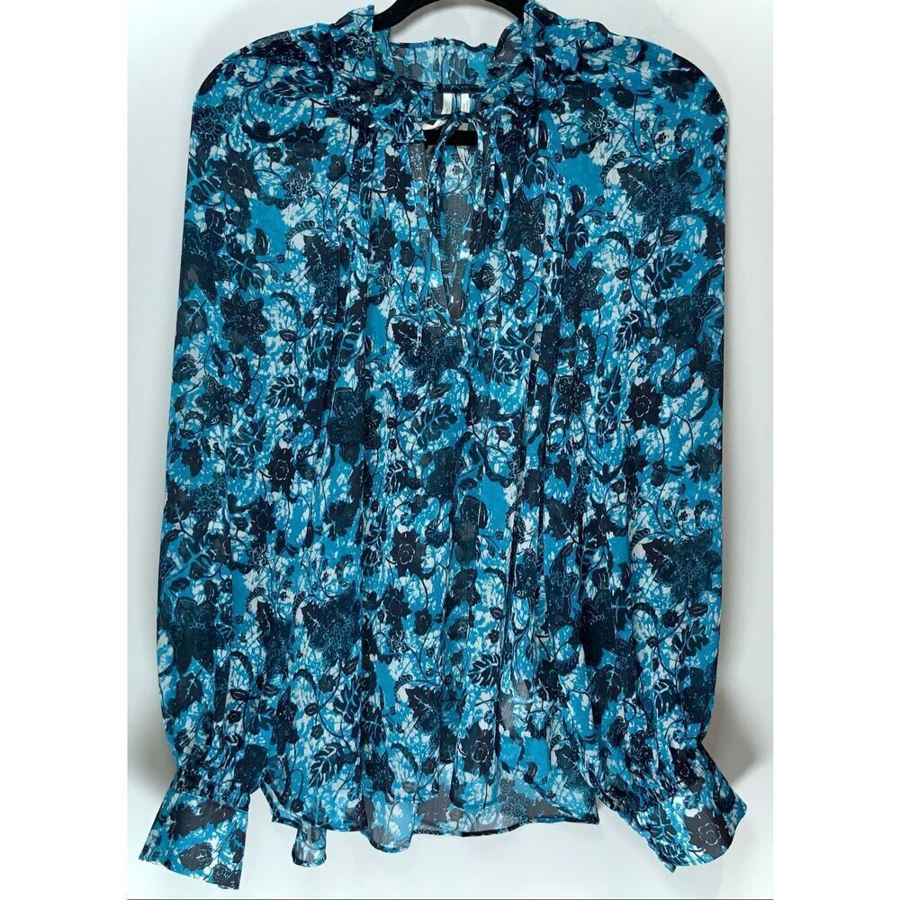 Anthropologie blue and black floral peasant blouse with a ruffle neck and tie ke